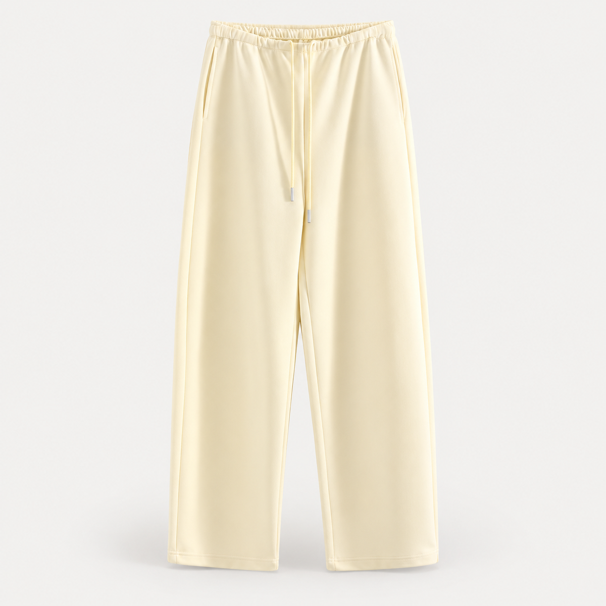 DrapeLine Wide Leg Trousers in Apricot on a warm light-grey studio background