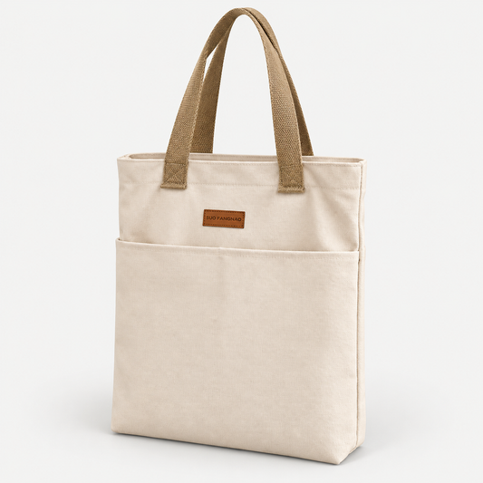 CoreCanvas Commuter Tote on a warm light-grey studio background