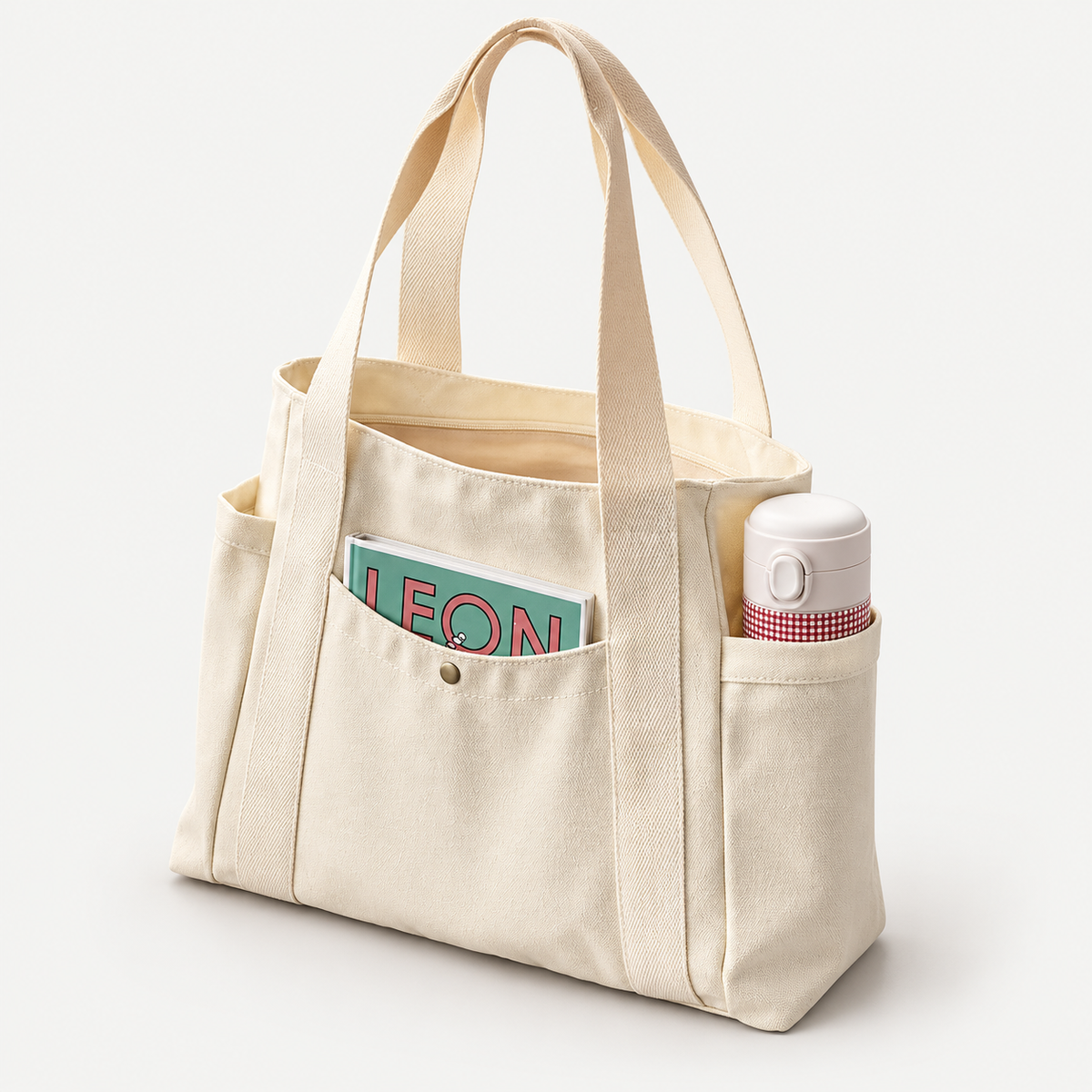 CoreCanvas Zip Tote on a warm light-grey studio background