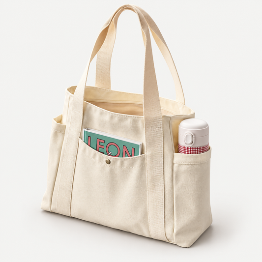 CoreCanvas Zip Tote on a warm light-grey studio background