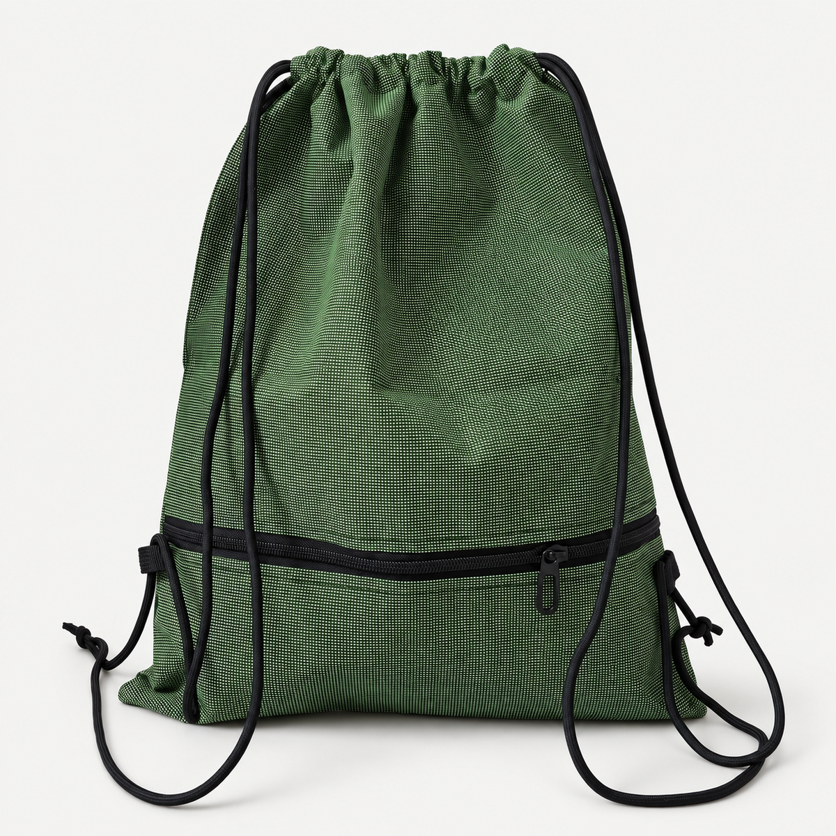 CoreFold Drawstring Backpack on a warm light-grey studio background